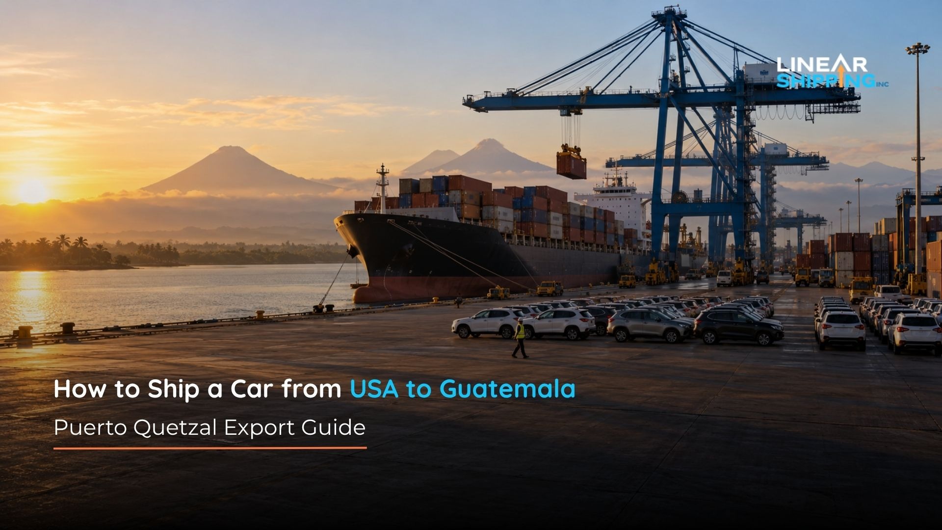 Imported cars discharged at a Pacific-coast Guatemalan container port with volcano silhouettes in the hazy distance
